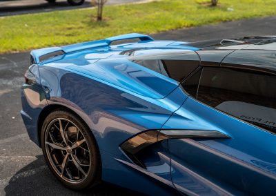 rear spoiler of blue corvette
